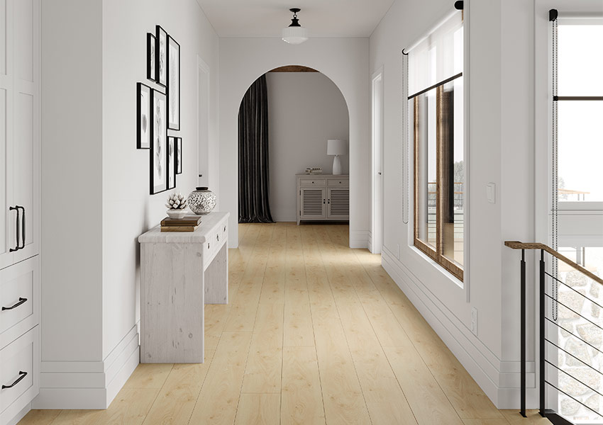 warm toned hardwood flooring in hallway